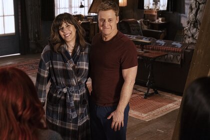 Heather (Edi Patterson) and Harry Vanderspeigle (Alan Tudyk) smile together on Resident Alien Episode 404.